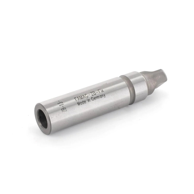 Metal cylindrical adapter with 'FAMAG ZBFix Made in Germany' text on side on a white background