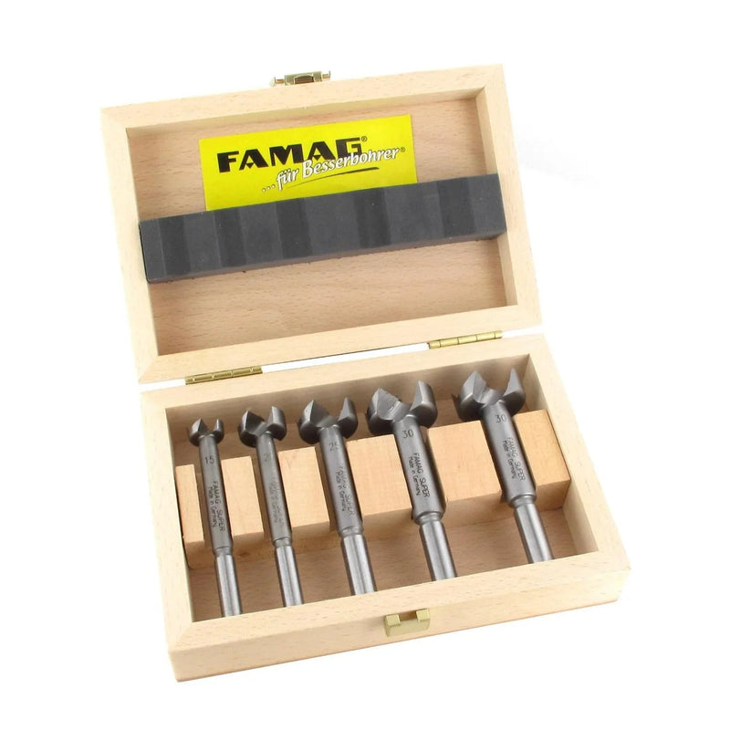 Set 5 of FAMAG Artificial drill bits in a wooden box on a white background