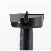 Black drill bit on a white background