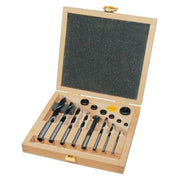 Set of 7 drill bits, 7 depth adjustment rings and a countersink in a wooden case on a white background